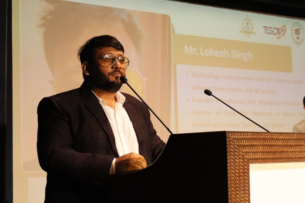 Lokesh Singh speaking at a conference